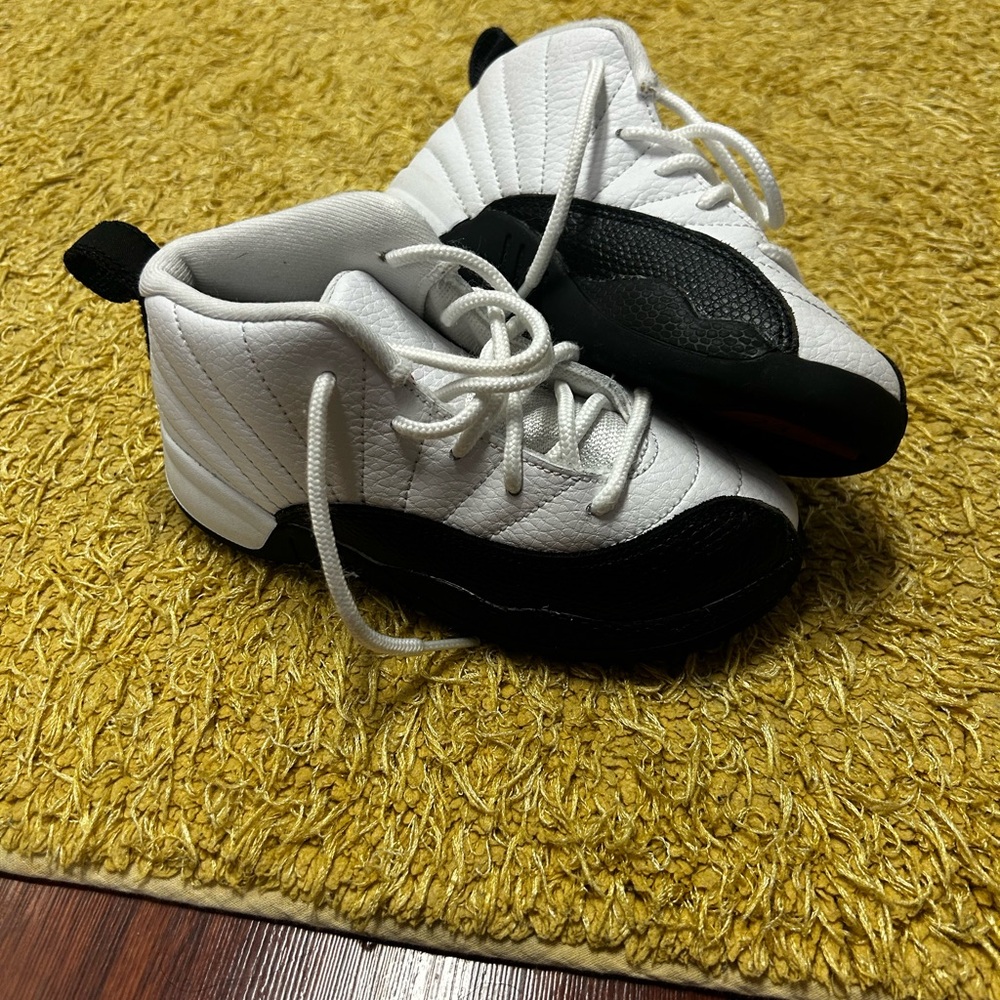 Jordan 12s. Size 10c. Black and white.